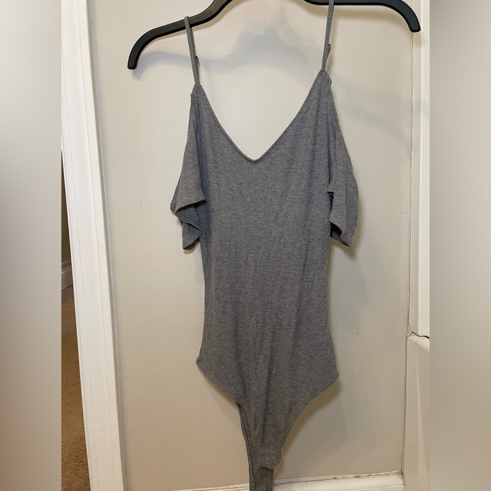 Hollister size small dark grey bodysuit with flounce sleeve